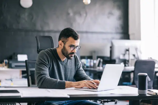 man working on laptop